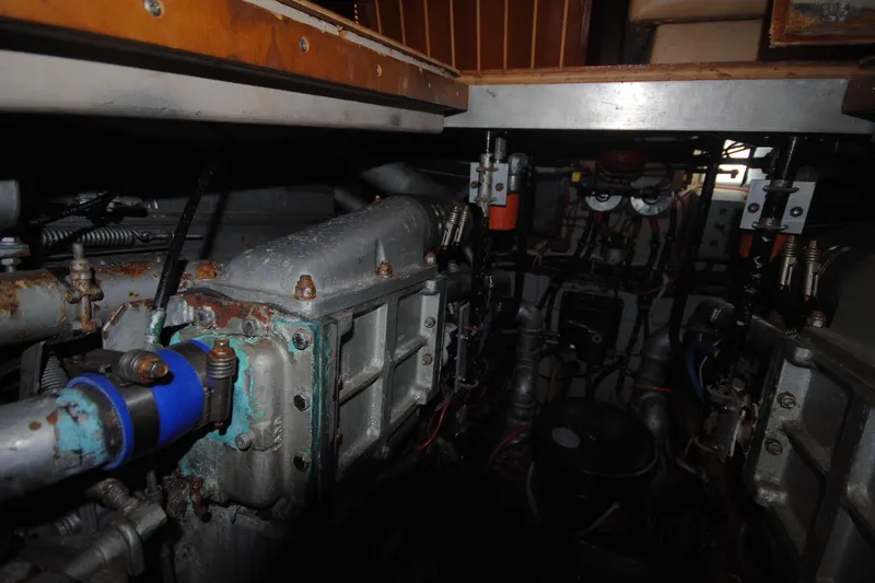 Slide: The Image of Engine room of a 1986 Viking 50 Motor Yacht, showcasing mechanical components. - 51
