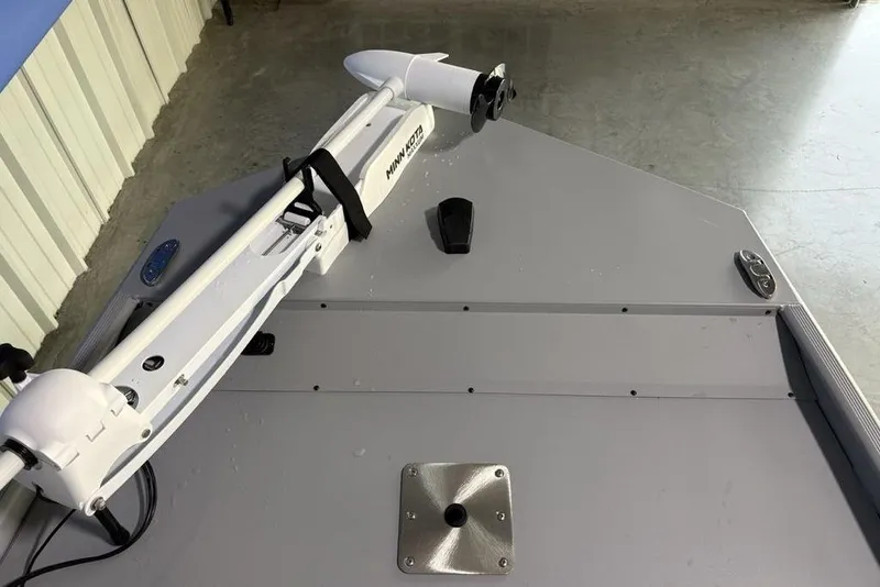 Slide: The Image of 2026 Tracker Bass Tracker Classic CC boat deck with Minn Kota trolling motor. - 2