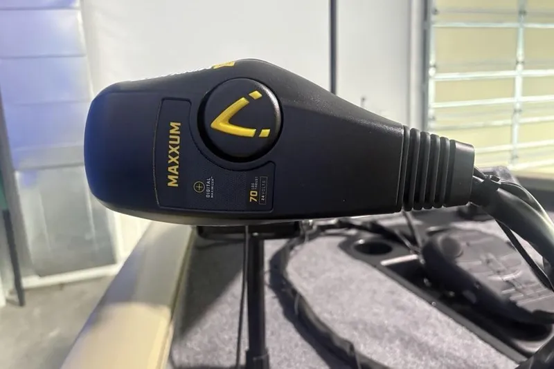 Slide: The Image of 2026 Tracker Pro Team 175 boat interior with cushioned seating and storage compartments. - 22