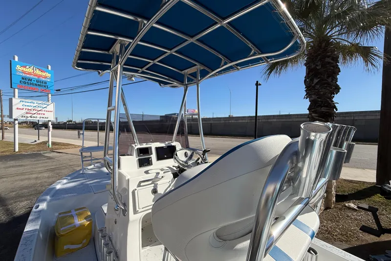 Slide: The Image of 2018 Shallow Sport 24 Modified V boat with blue canopy and modern console. - 32