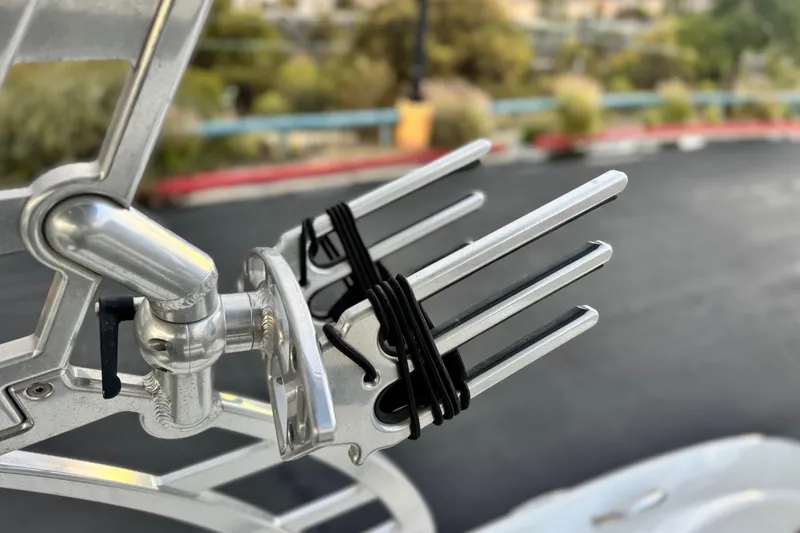 Slide: The Image of 2014 Cobalt 262 WSS boat detail with metal rack and black cords. - 14