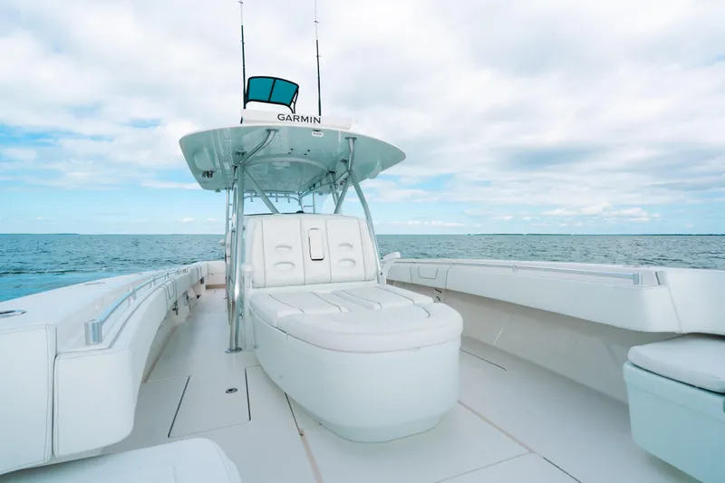 Slide: The Image of 2021 Contender 44 ST boat with spacious deck and ocean view. - 24