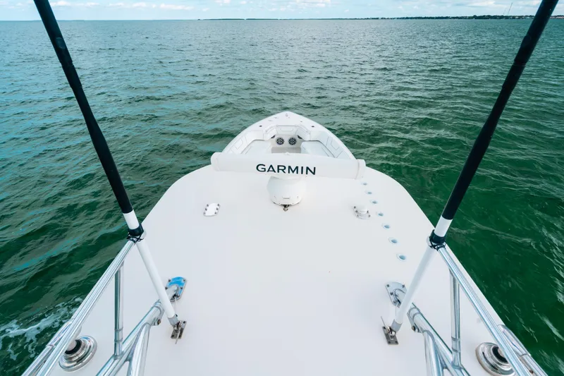 Slide: The Image of Bow view of 2021 Contender 44 ST boat on open water. - 27