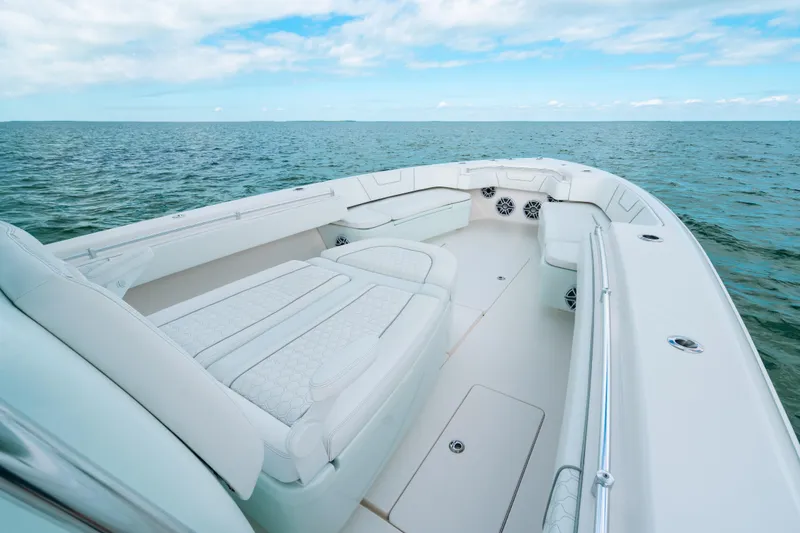Slide: The Image of 2021 Contender 44 ST boat with luxurious seating on open water. - 30
