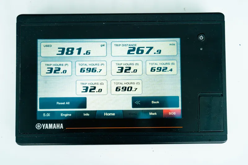 Slide: The Image of Yamaha display showing fuel usage and trip data for 2021 Contender 44 ST boat. - 42