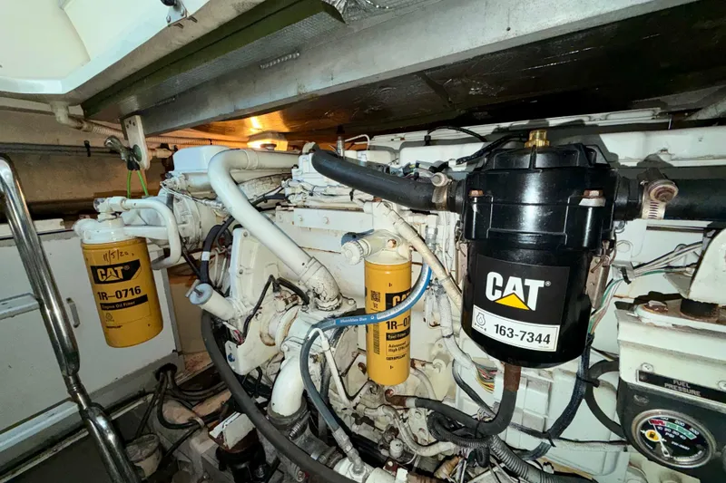 Slide: The Image of Engine room of 1997 Sea Ray 500 Sundancer with CAT components and filters. - 30