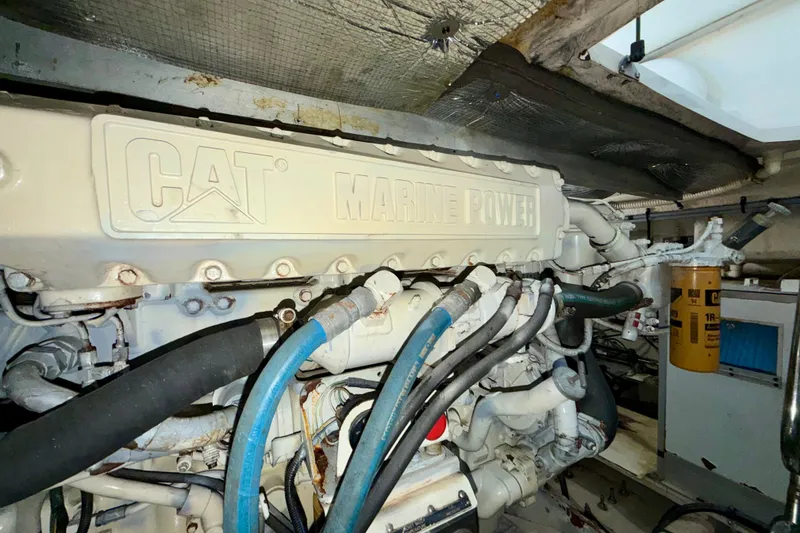 Slide: The Image of Engine room of 1997 Sea Ray 500 Sundancer with CAT Marine Power engine. - 31