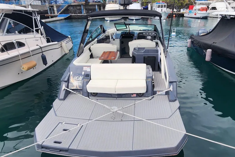 Slide: The Image of 2022 Cruisers Yachts 338 South Beach Edition Bow Rider docked at marina. - 18