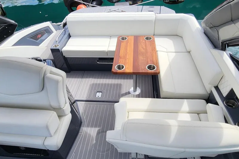 Slide: The Image of Luxurious seating area on 2022 Cruisers Yachts 338 South Beach Edition Bow Rider. - 22