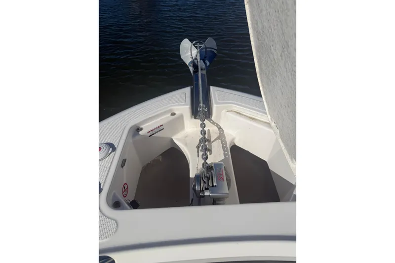 Slide: The Image of 2022 Robalo R242 Explorer boat anchor system on deck, close-up view. - 19