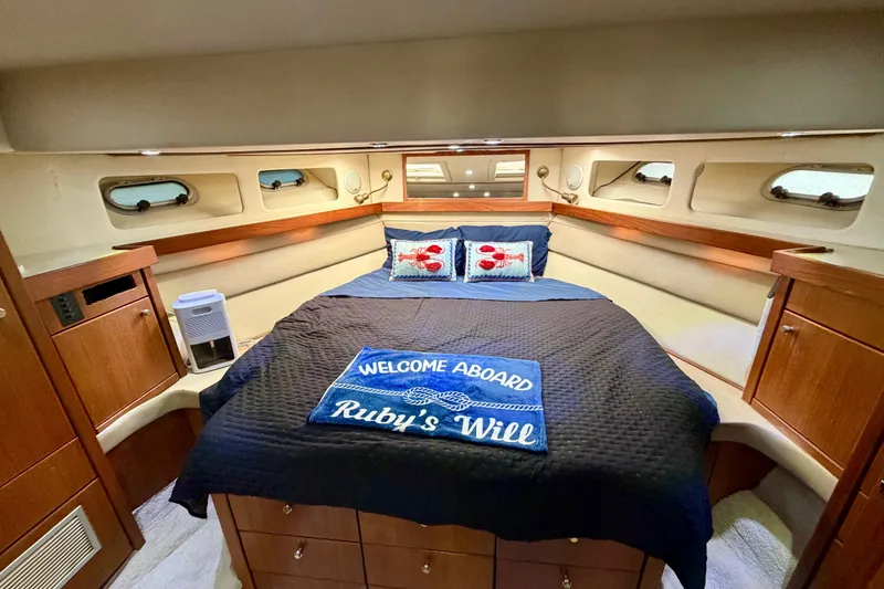 Slide: The Image of Luxurious bedroom in 1995 Bayliner 4788 Pilot House Motoryacht with cozy decor. - 32
