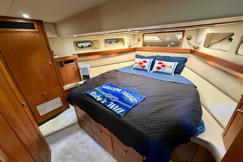 Slide: The Image of Luxurious bedroom in 1995 Bayliner 4788 Pilot House Motoryacht with cozy decor. - 33