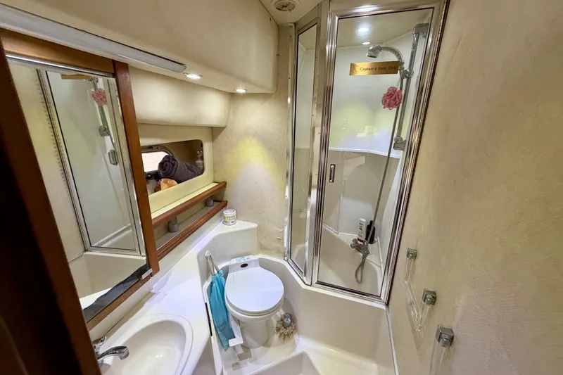 Slide: The Image of Bathroom interior of 1995 Bayliner 4788 Pilot House Motoryacht with shower and toilet. - 38