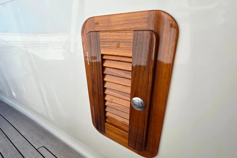Slide: The Image of Wooden hatch detail on 2013 Boston Whaler 320 Outrage boat. - 20