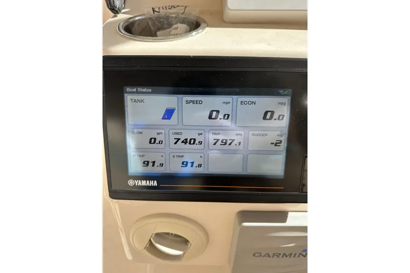 Slide: The Image of Yamaha boat status display on 2016 Chris-Craft Catalina 23, showing fuel and trip data. - 22