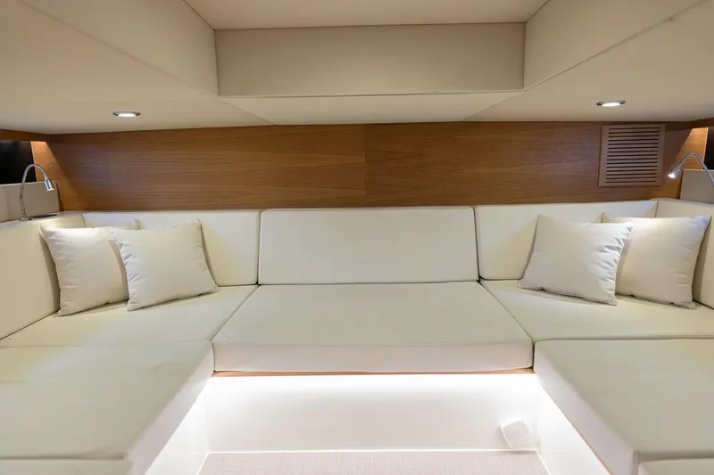 Slide: The Image of Luxurious interior of 2023 De Antonio Yachts D42 Open with plush seating and ambient lighting. - 22