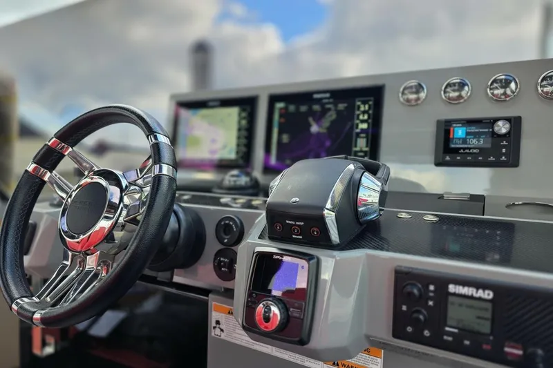 Slide: The Image of Cockpit of 2023 De Antonio Yachts D42 Open with advanced navigation systems. - 5