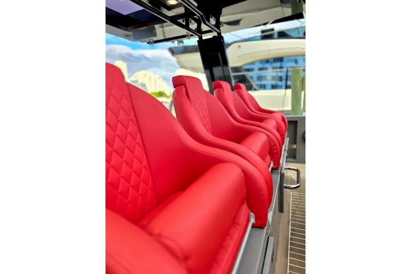 Slide: The Image of Red leather seats on 2023 De Antonio Yachts D42 Open, showcasing luxury and style. - 7