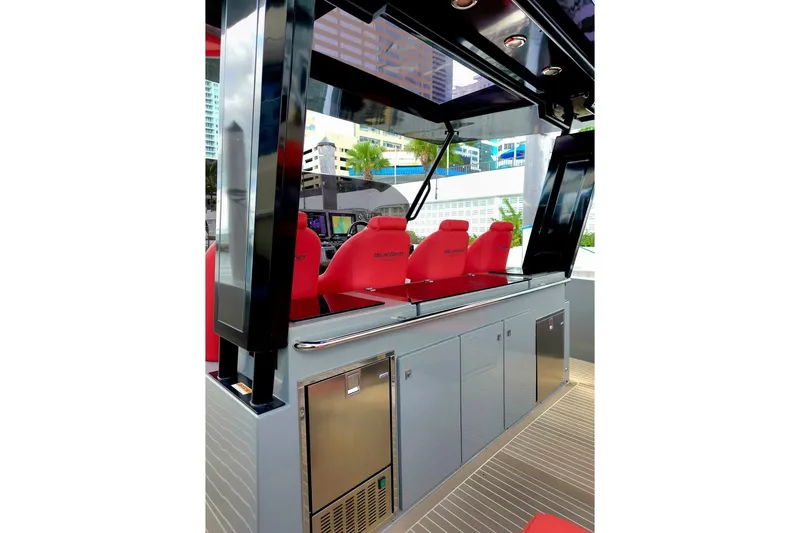 Slide: The Image of 2023 De Antonio Yachts D42 Open interior with red seating and sleek cabinetry. - 9