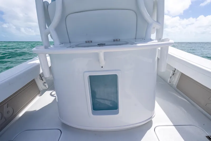 Slide: The Image of 2026 Yellowfin 26 Hybrid boat console with ocean backdrop. - 25