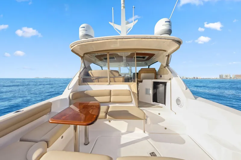 Slide: The Image of 2008 Tiara Yachts 4300 Sovran, luxury yacht interior with seating and table, ocean view. - 19