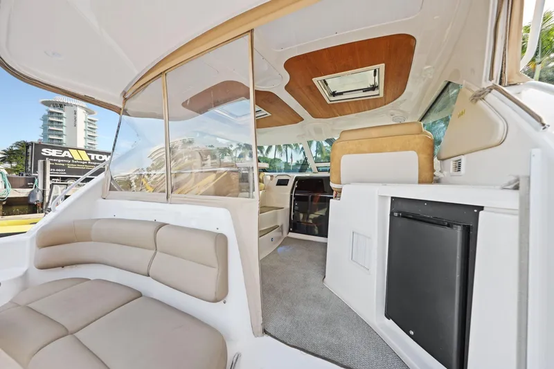 Slide: The Image of Interior of 2008 Tiara Yachts 4300 Sovran, featuring seating and modern amenities. - 21