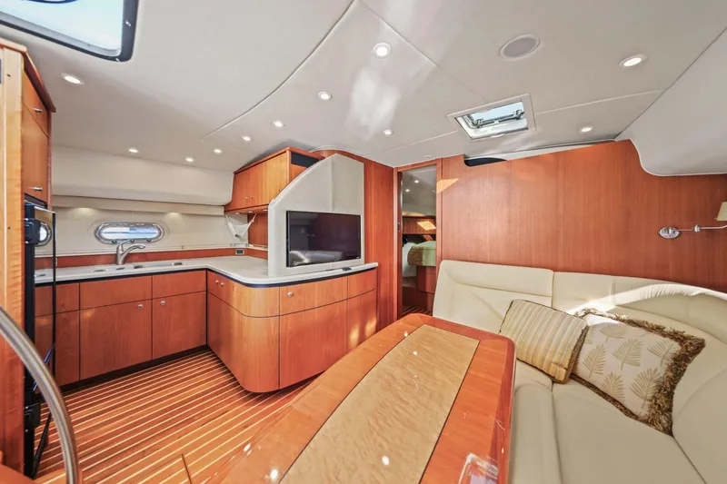 Slide: The Image of Luxurious interior of 2008 Tiara Yachts 4300 Sovran with elegant wood finishes. - 27