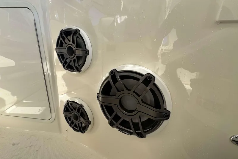 Slide: The Image of Speakers on a 2022 Boston Whaler 380 Realm boat, showcasing marine audio system. - 34