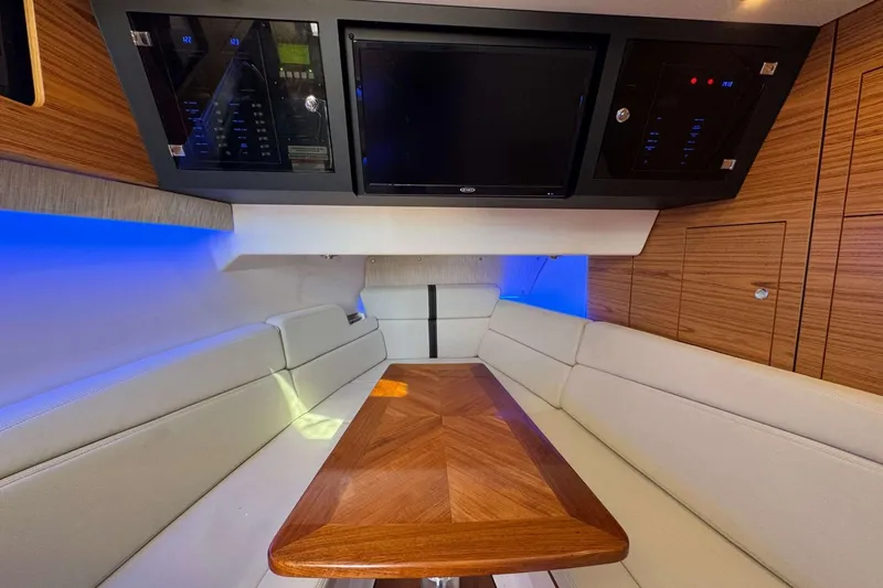 Slide: The Image of Luxurious interior of 2022 Boston Whaler 380 Realm with elegant seating and modern amenities. - 37