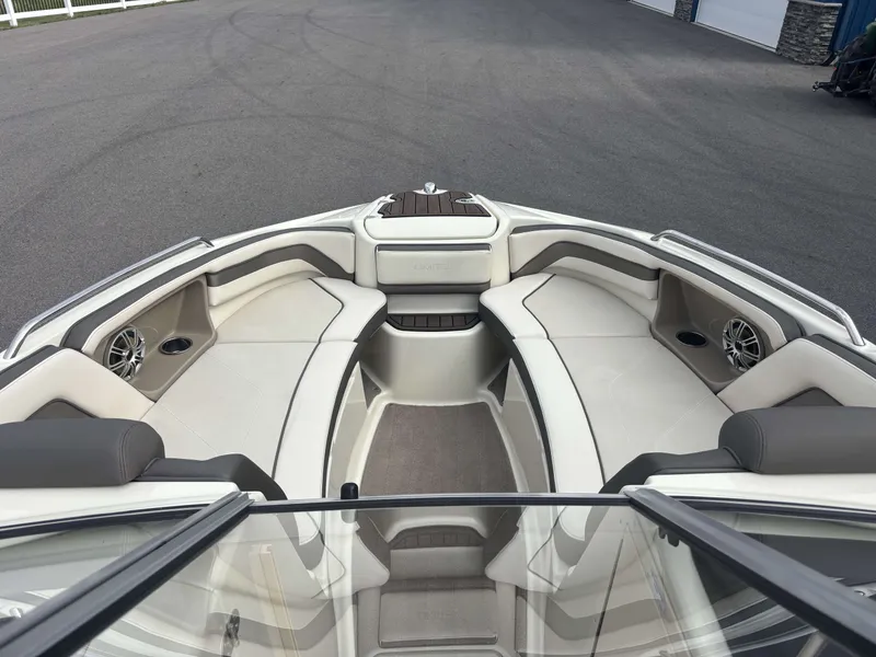 Slide: The Image of Interior of a 2015 Yamaha AR242 Limited boat with seating area. - 25