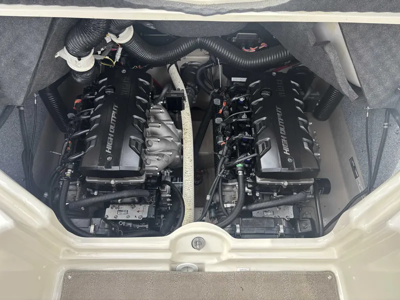 Slide: The Image of Engine compartment of 2015 Yamaha Boats AR242 Limited with dual high-output engines. - 27