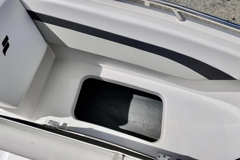 Slide: The Image of 2026 Starcraft SVX 171 OB boat interior storage compartment, featuring sleek design and ample space. - 14