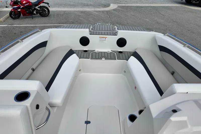 Slide: The Image of Interior of 2026 Starcraft SVX 171 OB boat with seating and cup holders. - 6