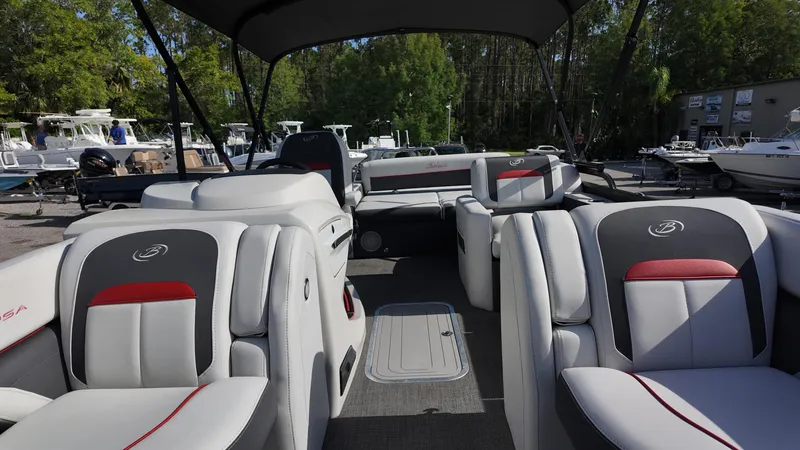 Slide: The Image of 2022 Barletta Corsa 23U pontoon boat interior with luxurious seating and modern design. - 11