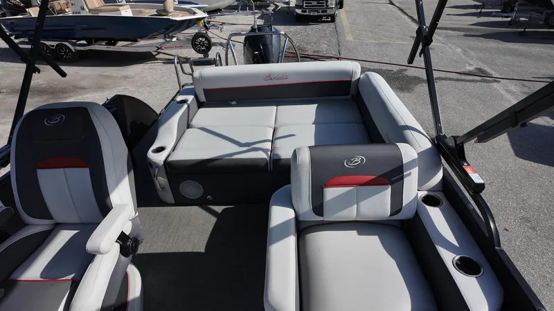 Slide: The Image of 2022 Barletta Corsa 23U boat interior with stylish seating and cup holders. - 14