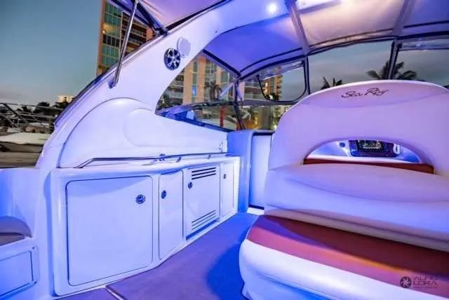 Slide: The Image of Interior of 2002 Sea Ray 380 Sundancer yacht with blue LED lighting. - 14