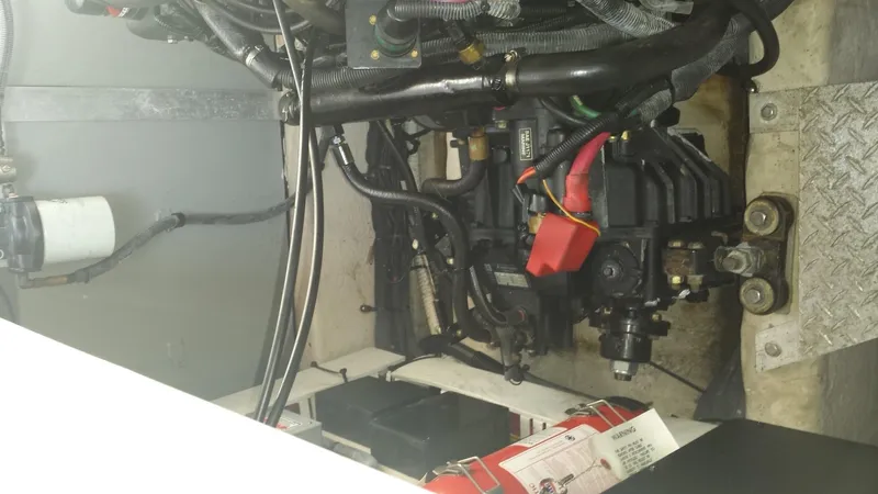 Slide: The Image of Engine compartment of a 2002 Sea Ray 380 Sundancer boat. - 17