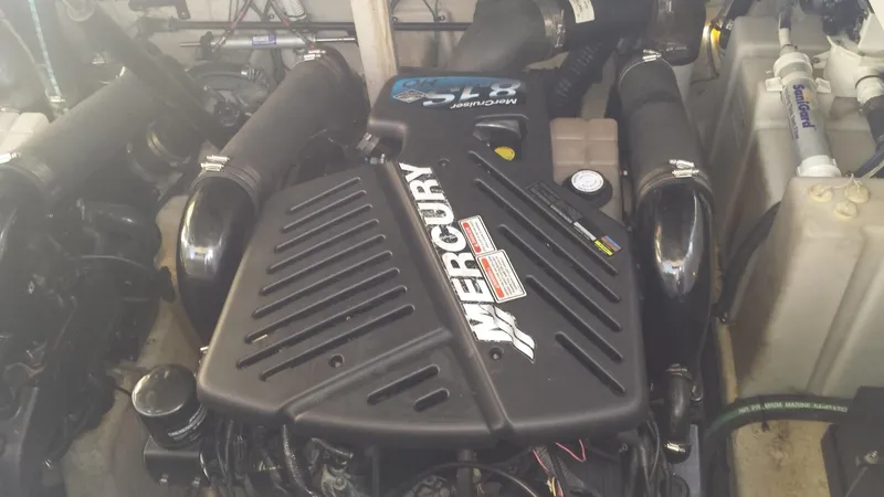 Slide: The Image of Mercury engine in a 2002 Sea Ray 380 Sundancer boat. - 18