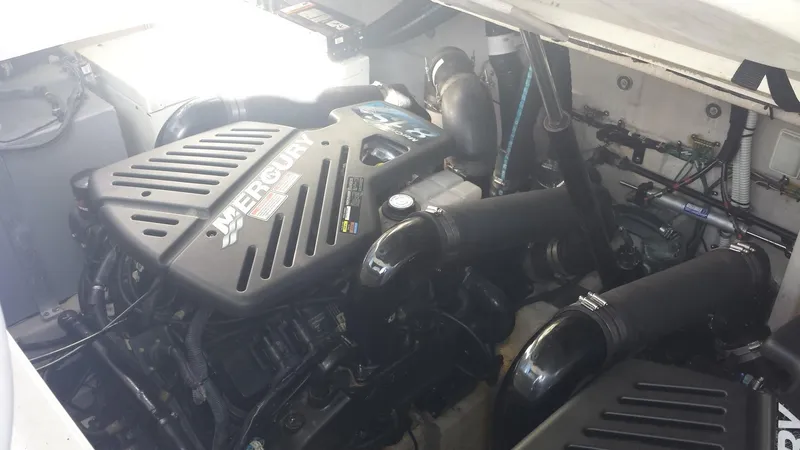 Slide: The Image of Engine compartment of a 2002 Sea Ray 380 Sundancer with MerCruiser engines. - 19