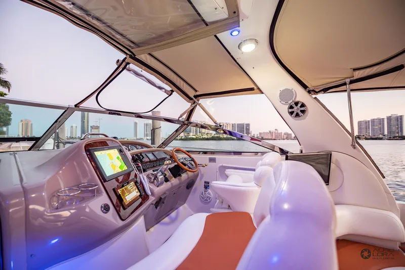 Slide: The Image of Luxurious 2002 Sea Ray 380 Sundancer yacht interior with modern navigation system. - 6
