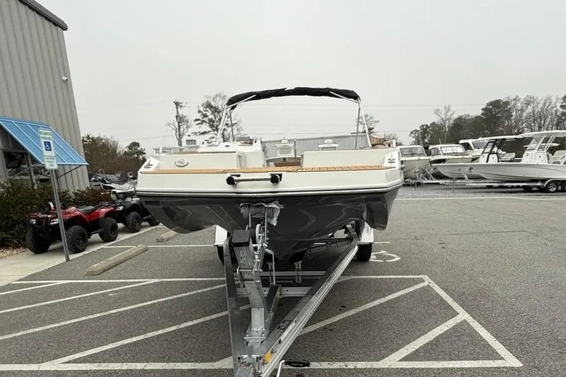 Slide: The Image of 2026 Starcraft SVX 191 OB boat on trailer in parking lot. - 5