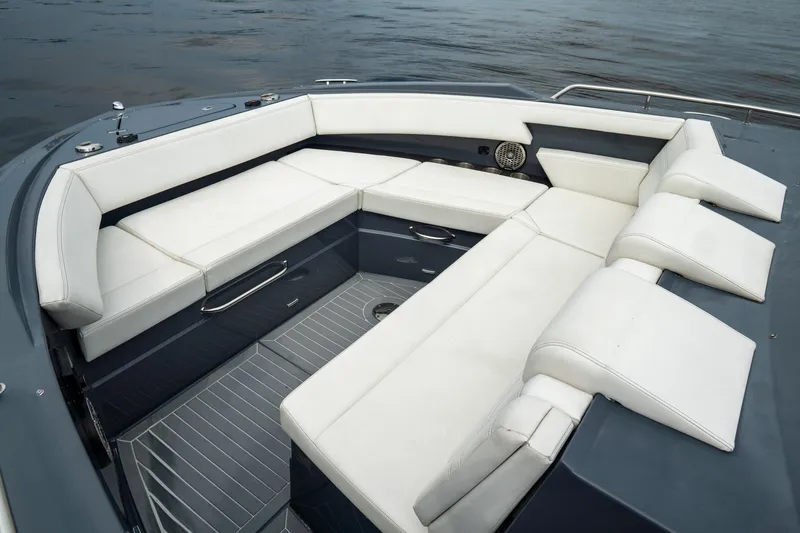 Slide: The Image of 2022 Cruisers Yachts 38 GLS with luxurious white seating on deck. - 17
