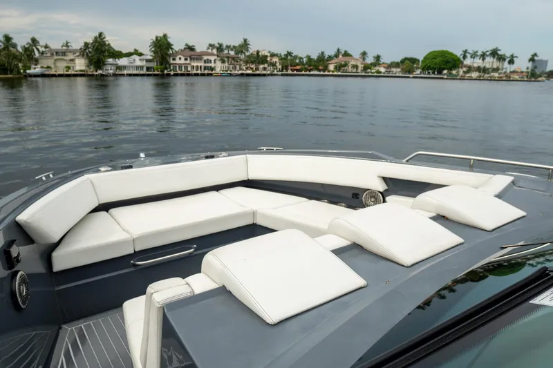 Slide: The Image of 2022 Cruisers Yachts 38 GLS with spacious seating on calm waters. - 13