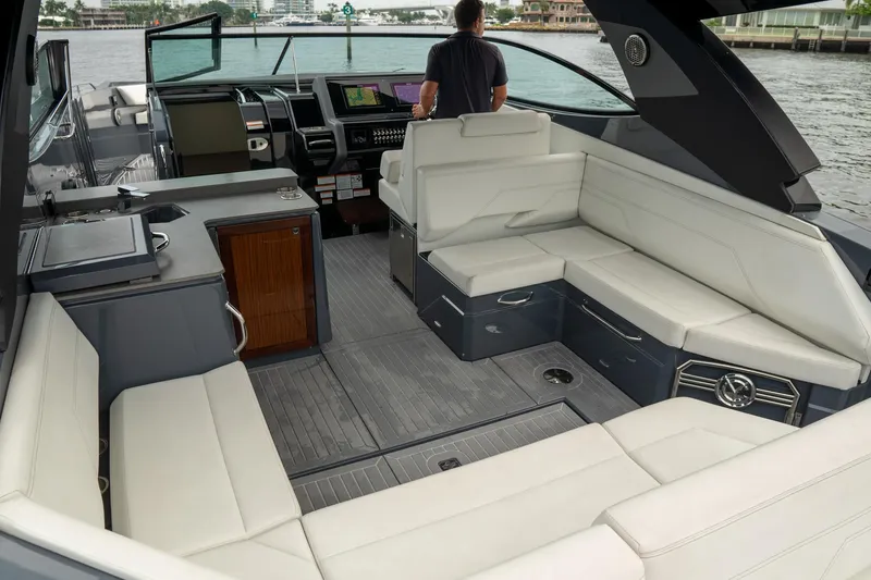 Slide: The Image of 2022 Cruisers Yachts 38 GLS interior with spacious seating and modern helm. - 28