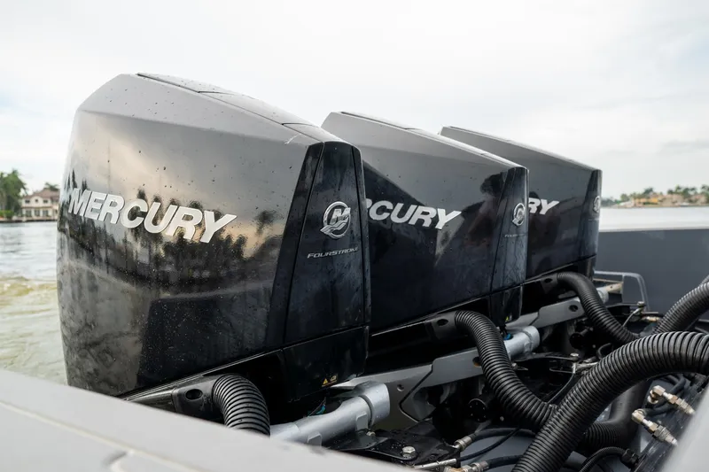 Slide: The Image of Triple Mercury outboard engines on a 2022 Cruisers Yachts 38 GLS. - 44
