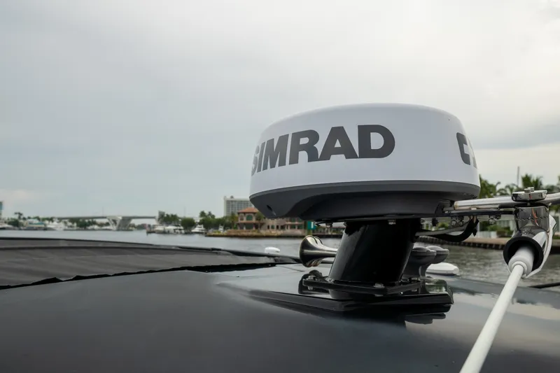 Slide: The Image of 2022 Cruisers Yachts 38 GLS with Simrad radar on deck, dockside view. - 8