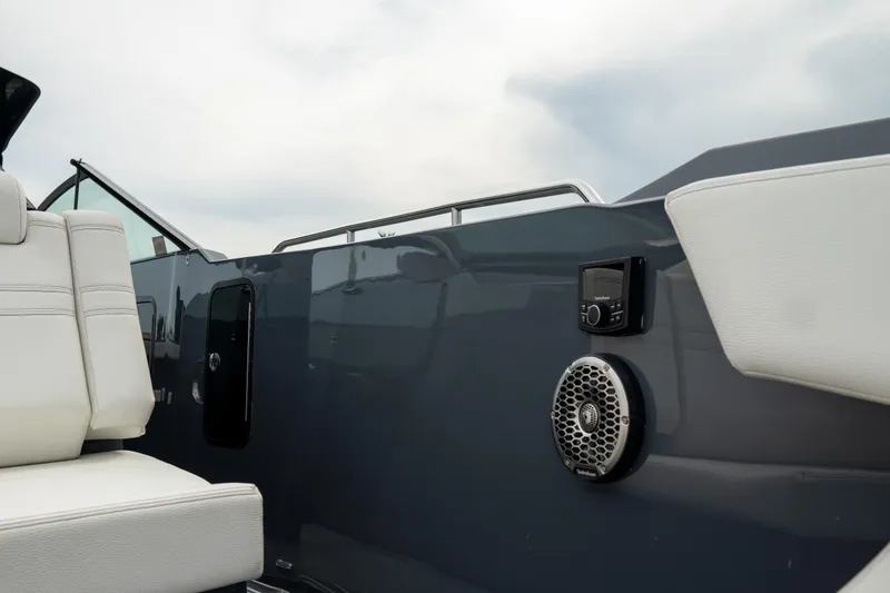 Slide: The Image of 2022 Cruisers Yachts 38 GLS interior with white seating and audio system. - 9