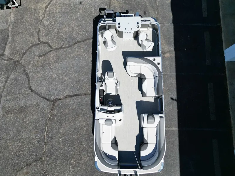 Slide: The Image of 2024 Tahoe 21LTZ RF helm with Garmin navigation system. - 13