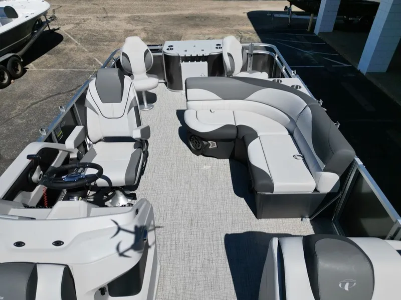 Slide: The Image of 2024 Tahoe 21LTZ RF pontoon boat with Yamaha motor on trailer. - 8