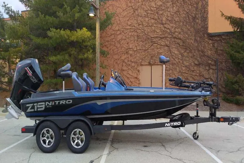 The Image of 2026 Nitro Z19 XL Pro boat on trailer, parked outdoors. - 0